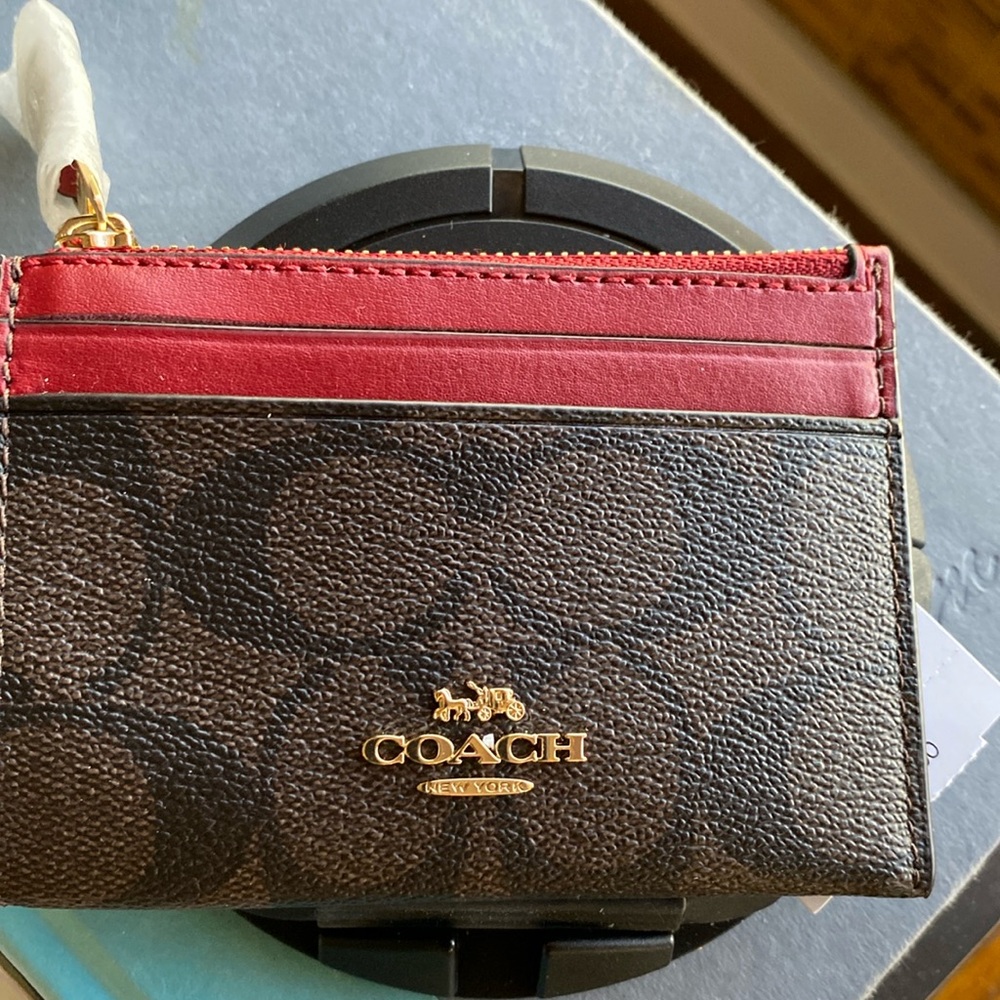 COACH Woman’s Coin Case
NWT!!